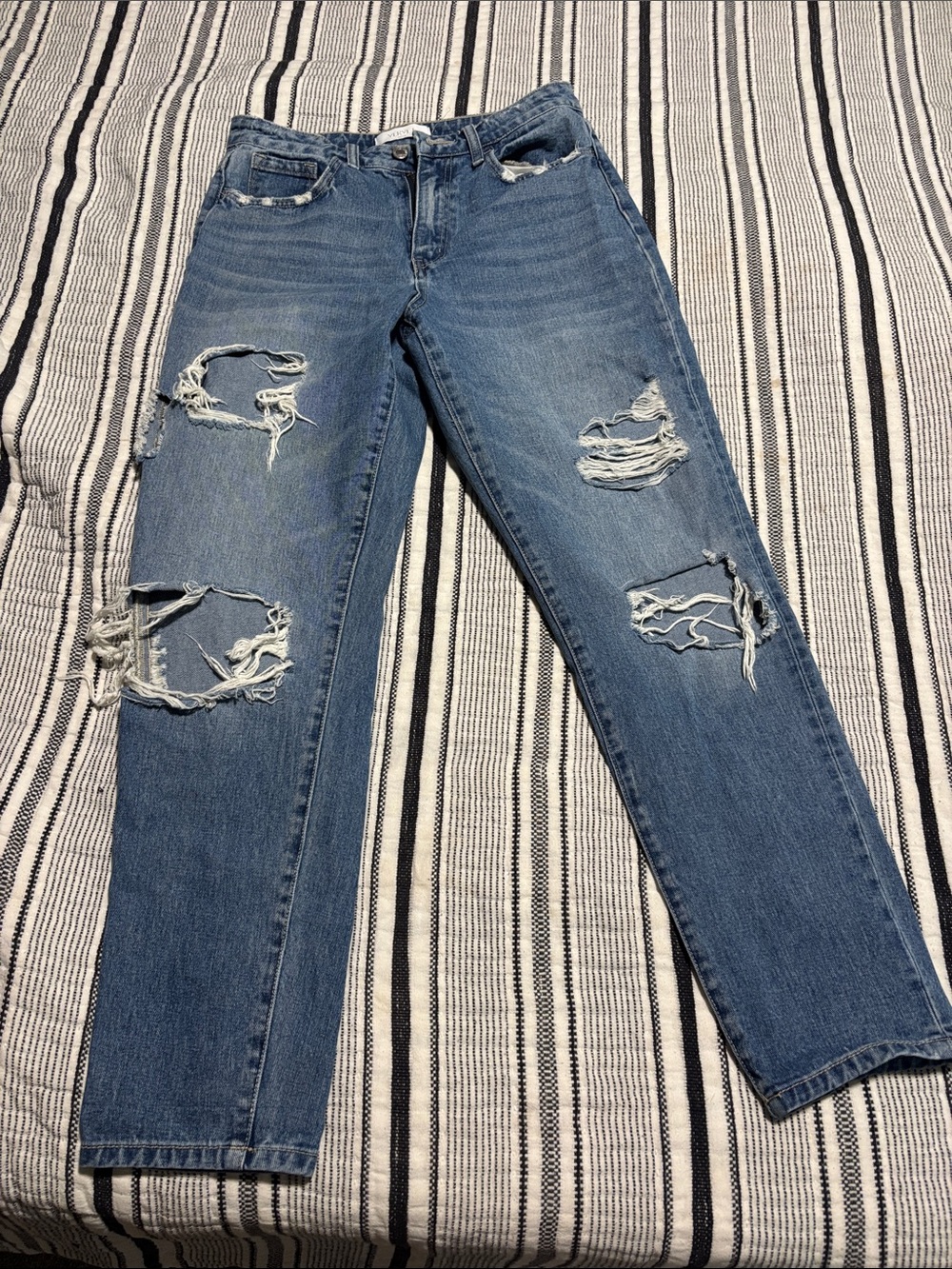Distressed High-Rise Ankle Jeans in Medium Blue